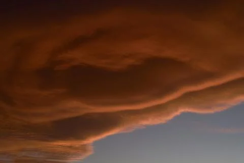 A sky light after sunset. orange background Stock Photos