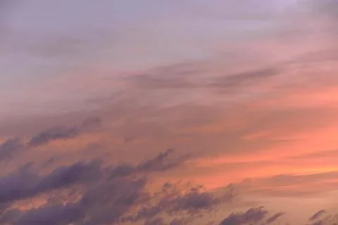 Sky light after sunset. orange background, clouds Stock Photos