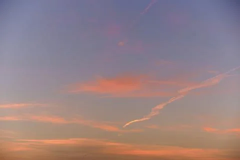 Sky light after sunset. orange background, clouds Stock Photos