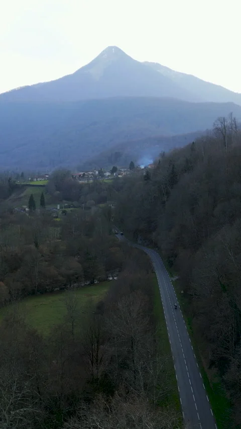 From the sky mountains with a road Stock Footage 276326016