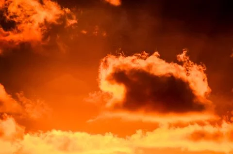 The sky is orange and cloudy Stock Photos