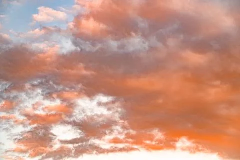 Sky with orange clouds. Cloudy sunset Stock Photos