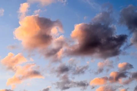 Sky with orange clouds in the evening Stock Photos