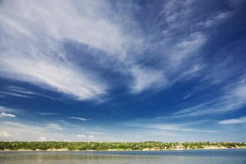 Sky over the river Stock Photos