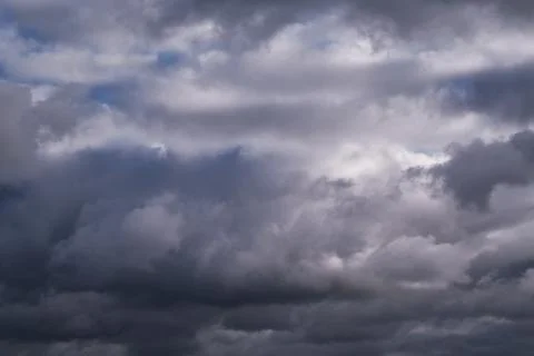 The sky is overcast with gray clouds, the sky in the clouds Stock Photos