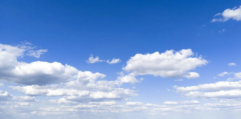 Sky panorama with cloudscape clouds. Blue sky holds white clouds. Bright sk.. Stock Photos