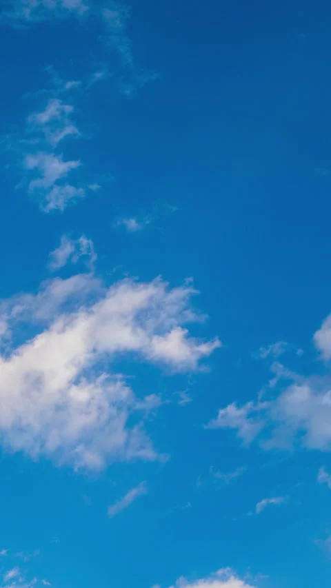 A sky with passing clouds vertical Video stock 262104809