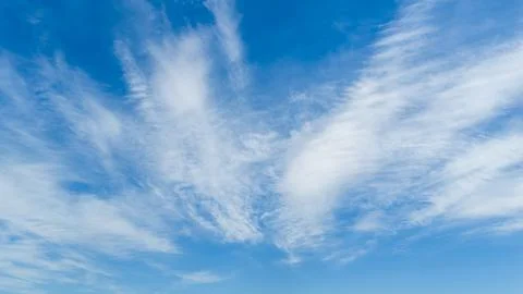 Sky pattern with white clouds. Blue sky frames fluffy clouds. Bright sky ho.. 写真素材