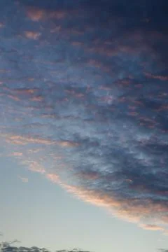 Sky with Pink Cloudscape at Sunset Stock Photos