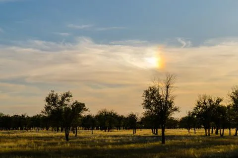 Sky with a rainbow in the sun Stock Photos