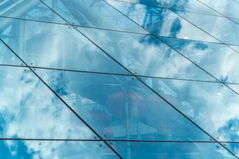Sky Reflected on Glass with Grid Diagonal Pattern Фото