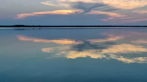 The sky is reflected in the lagoon Stock Footage 136855666