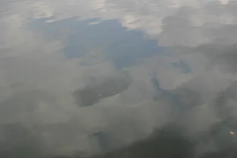 Sky Reflected in Lake Stock Photos