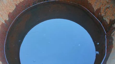 The sky is reflected in the water. Stock Photos