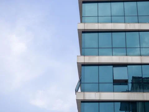 The sky is reflected in the windows. Turkey. glazed windows. Modern urban arc Stock Photos
