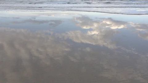 Sky Reflecting on Beach Stock Footage