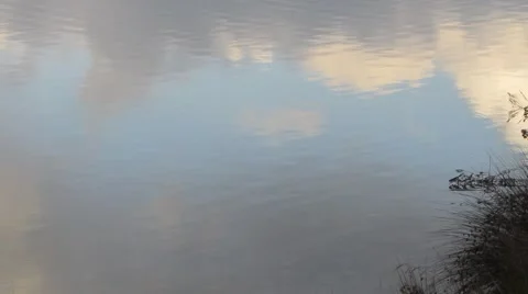 Sky reflection on a mountain lake Stock Footage 44682700