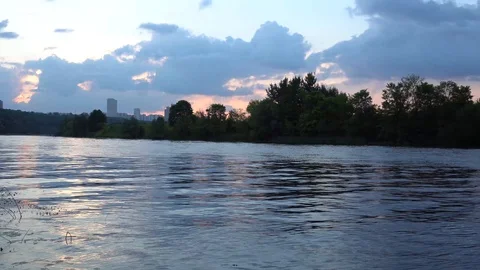 Sky reflection in the river at sunset 4K Stock Footage 92632548