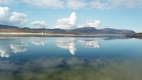 Sky Reflection on  still water beach Stock Footage 136746124