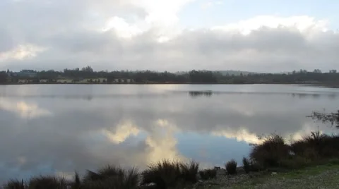 Sky reflection on a town reservoir. Stock Footage 44682584