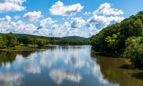 The sky reflection upon the Allegheny river in Tidioute, Pennsylvania, USA Stock Photos