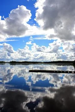 Sky reflection in water Stock Photos