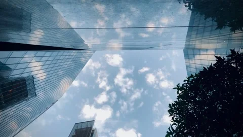 Sky reflects on mirror building Stock Footage 245852777