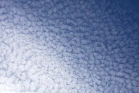 Sky with rows of cirrocumulus clouds Stock Photos