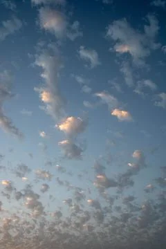 Sky with Scattered Clouds at Sunset Stock Photos