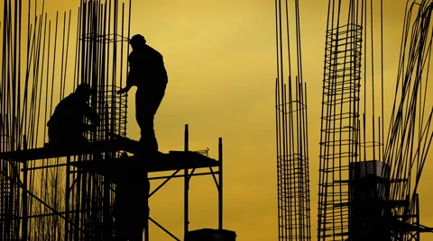 Sky Scraper Building Construction Silhouettes at Sunset Vibrant Sky Video stock 62888872