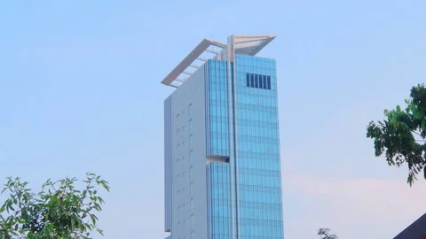 Sky scraper at east bekasi summarecon with blue sky Stock Footage 253596166