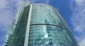 The sky-scraper time lapse clouds reflection HD Footage