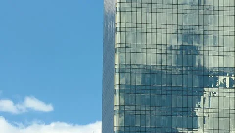 The sky-scrapers windows with clouds reflection, time lapse Stock-Footage 11429240