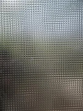 Sky Seen Through Patterned Window. Sunlit Sky With Reflections Beyond Decor.. Stock-Fotos