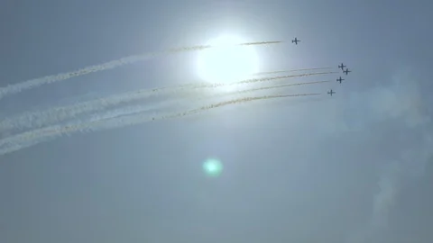 The sky Shines the sun Planes fly leaving a grey footprint Stock Footage 120390318
