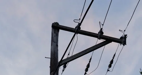 SKY SHOT OF WIRES WITH CLOUDS PASSING Stock Footage 131129318