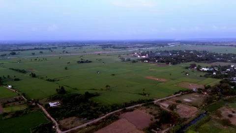The sky is soft and diffused, with clear visibility across the vast plain Stock Footage 314031371