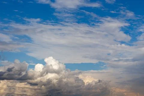 Sky with some dramatic clouds and orange sun Stock Photos