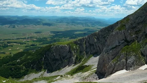 Sky sparkles with fluffy clouds above. Savin Kuk peak, Montenegro 動画素材 342977952