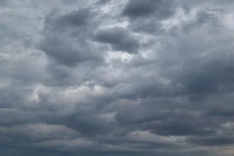 In the sky the storm clouds, and the clouds. Bad weather. Stock Photos