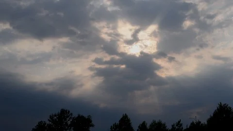 The sky with storm clouds at dusk with the sun Stock Footage 91683317