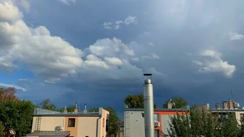 The sky before the storm. Puffy fluffy white clouds. Cumulus cloud timelapse. Stock Footage 219060406