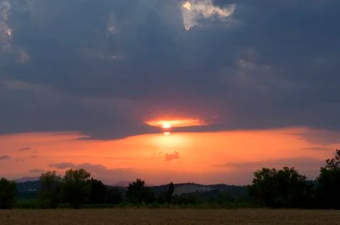 Sky of storm with sunset Stock Photos