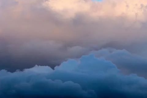 Sky with Stormy Dark Dramatic Blue Clouds. Abstract Texture Background Stock Photos