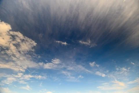 The Sky is Stuningly Beautiful, Featuring Fluffy Clouds that Illuminate the Worl Stockfoto's