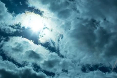 Sky with Sun and Clouds Stock Photos
