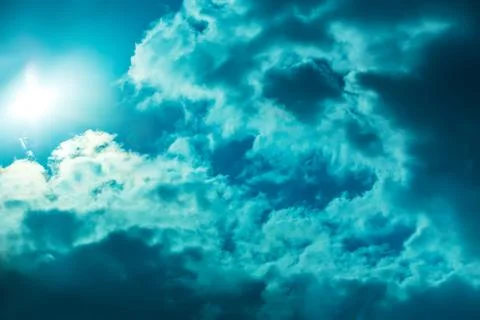 Sky with Sun and Clouds Stock Photos