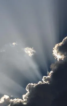 Sky with sun rays at dusk Stock Photos