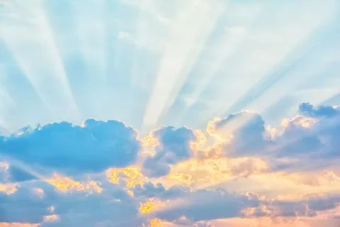 Sky with sun rays through the clouds Stock Photos