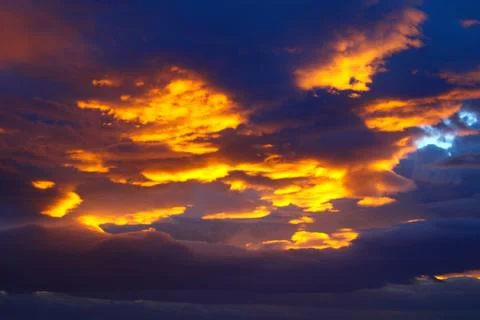 A sky with the sun shining through clouds Stock Photos